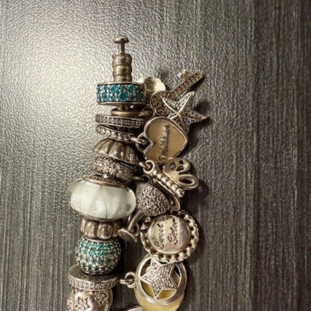 Authentic S925 Pandora Bracelet with 30 charms in excellent Preloved condition - Picture 8 of 9